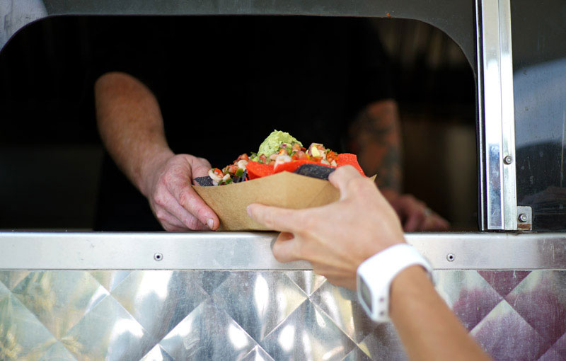 Man is serving food from food truck